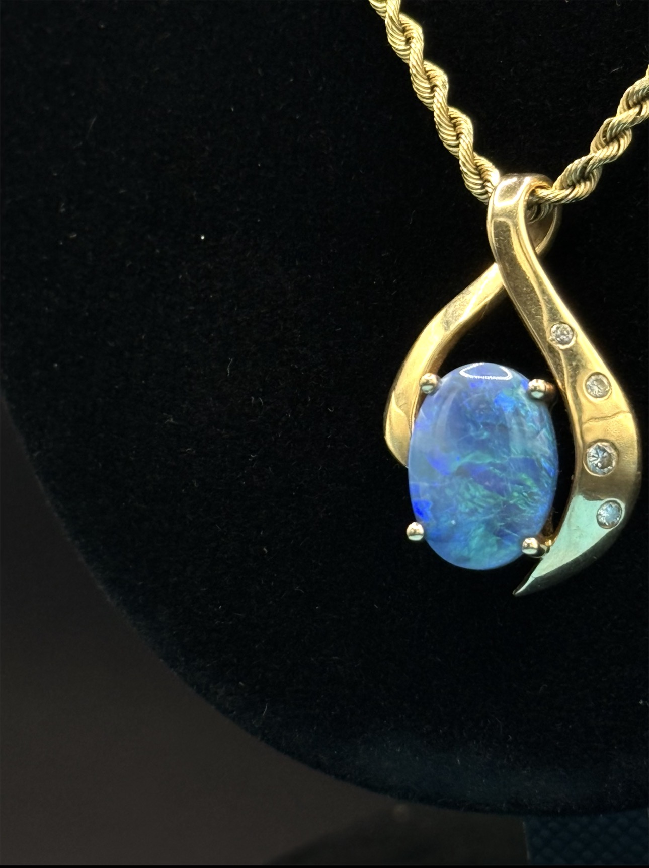 Gold pendant with oval Australian opal and diamonds