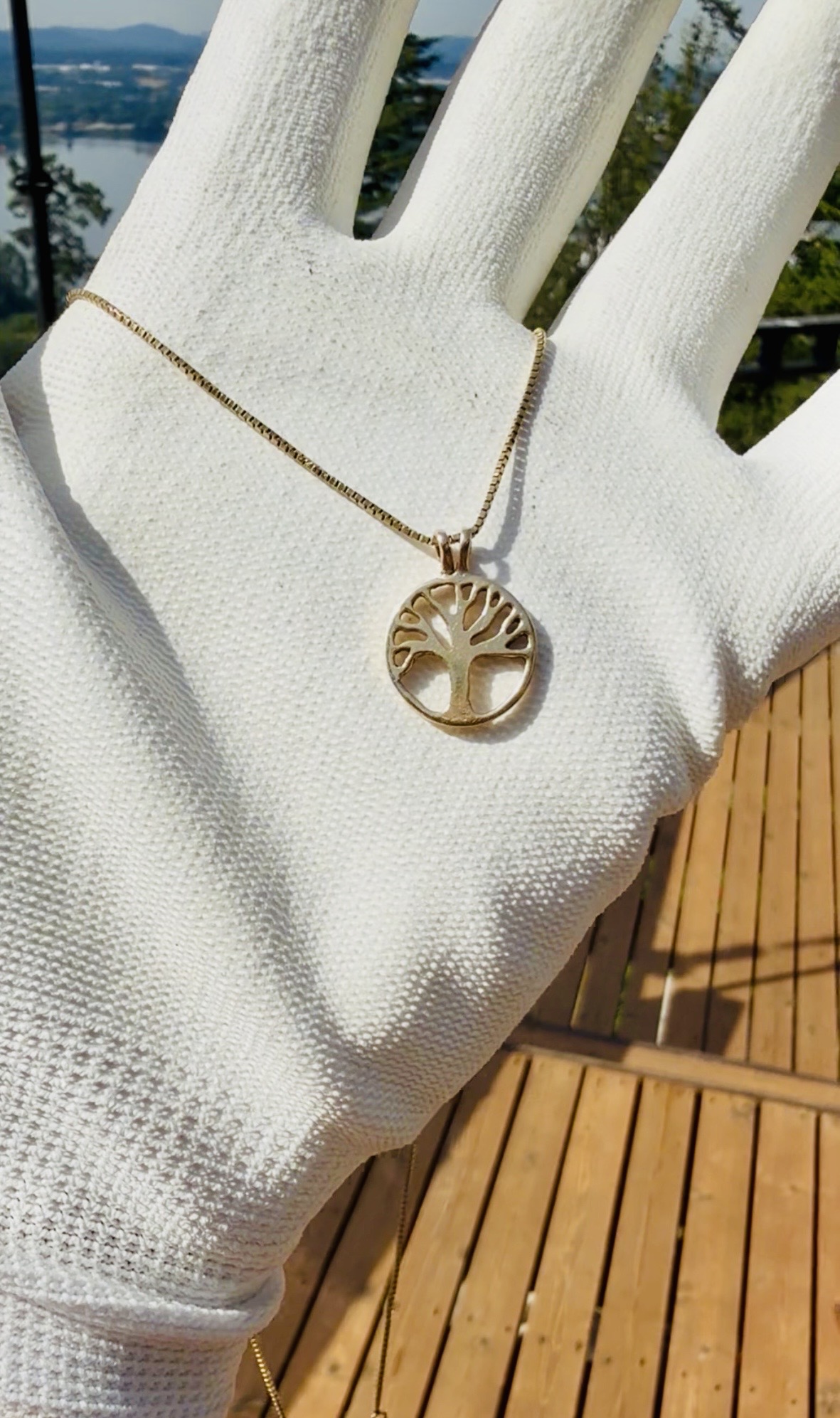 Gold tree of life pendant on box chain