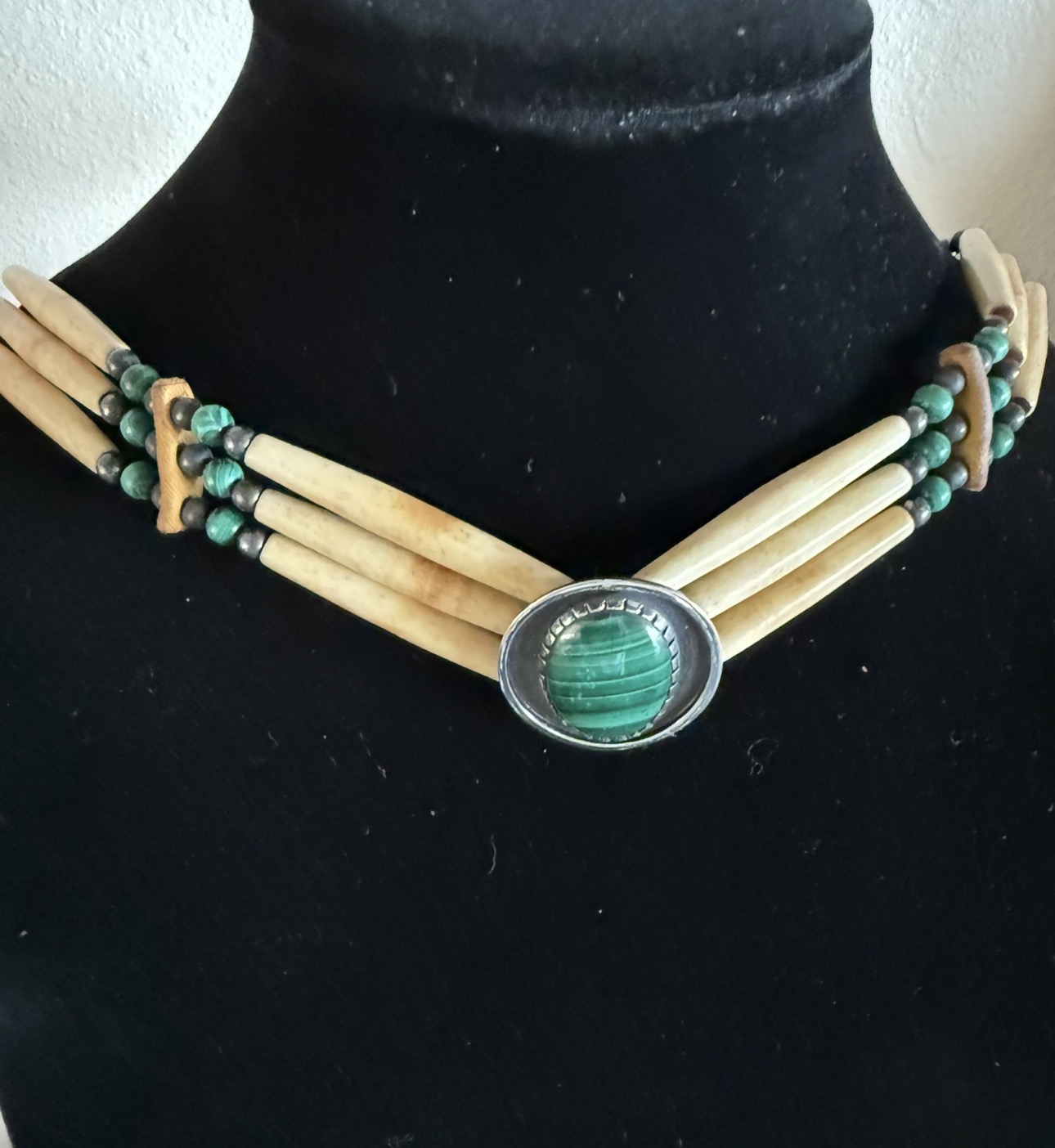 Bone and malachite three-strand choker with silver medallion