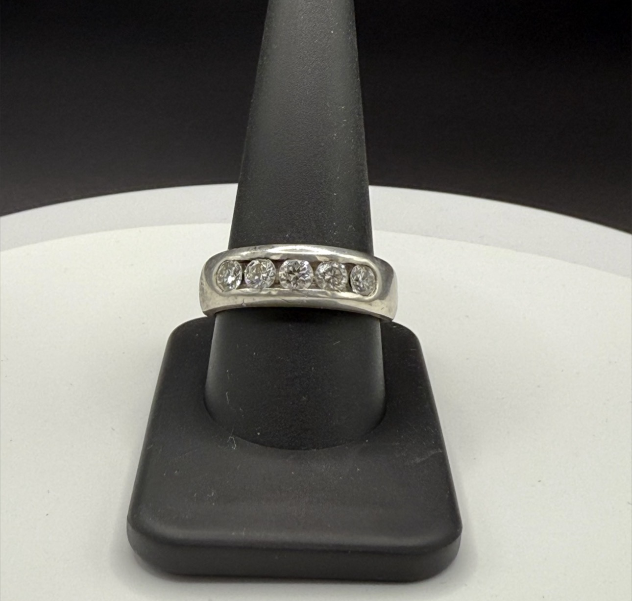 White gold channel-set five-diamond band